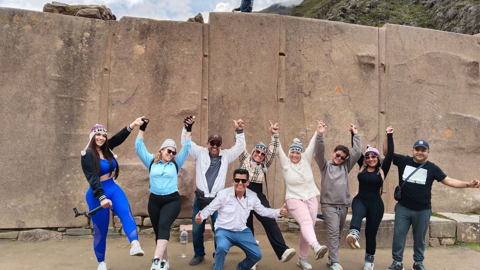 Travelers enjoying a full day Sacred Valley of the Incas tour near Cusco with traditional Inca sites